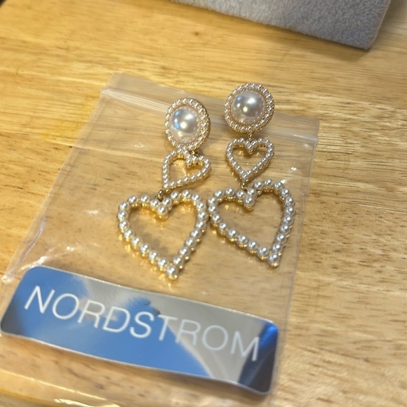 Nordstrom earrings. They’re beautiful pierced. There are two hearts connected​ - Picture 1 of 3